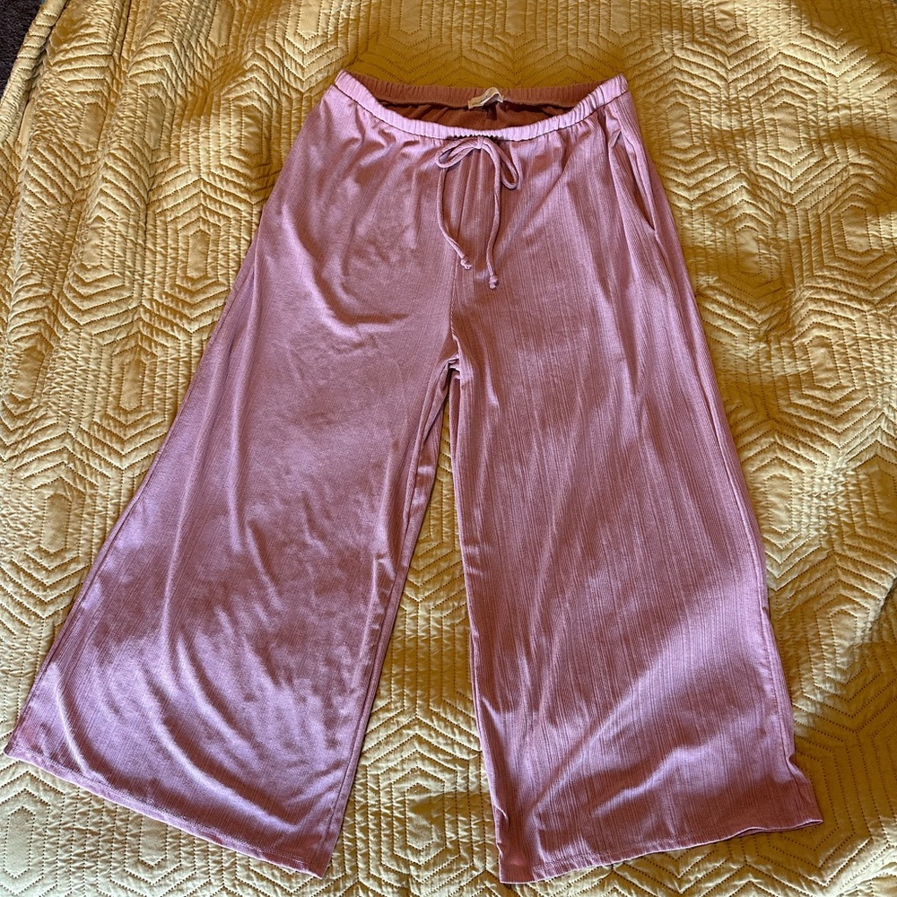 Pink wide leg pants.